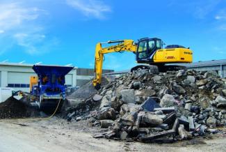 Rupsgraafmachines New Holland E215C LC
