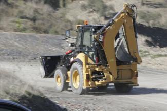 Graaflaadmachines Caterpillar 432E 4x4