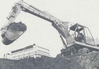 Rupsgraafmachines Caterpillar 214