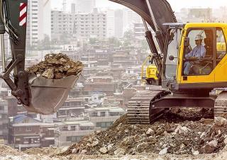 Rupsgraafmachines Volvo EC210B