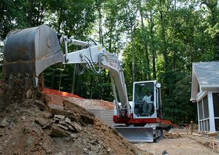 Rupsgraafmachines Takeuchi TB 285