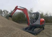 Rupsgraafmachines Neuson 8003