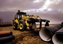 Graaflaadmachines New Holland B 115 B
