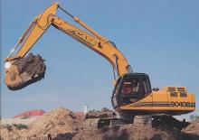 Rupsgraafmachines Case 9040B