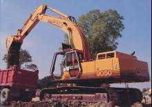 Rupsgraafmachines Case 9050