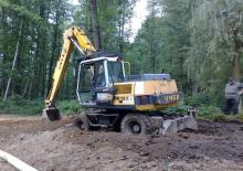 Rupsgraafmachines Unex DH 12.1 R