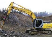 Rupsgraafmachines New Holland E 305 B LC