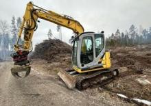 Rupsgraafmachines New Holland E70