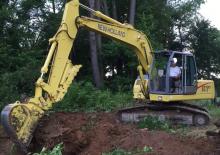 Rupsgraafmachines New Holland EC130
