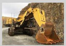 Rupsgraafmachines Unex EH 921