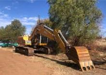 Rupsgraafmachines Bell HX230E