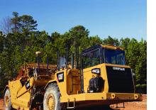 Schrapers Caterpillar 613G