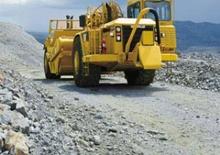 Schrapers Caterpillar 621G Auger