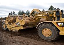 Schrapers Caterpillar 637G Auger