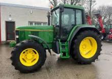 Tractoren met vierwielaandrijving John Deere 6506