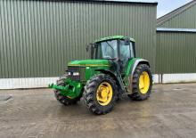 Tractoren met vierwielaandrijving John Deere 6900