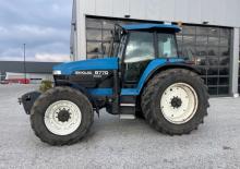 Tractoren met vierwielaandrijving Ford-NH 8770 TA Powers.